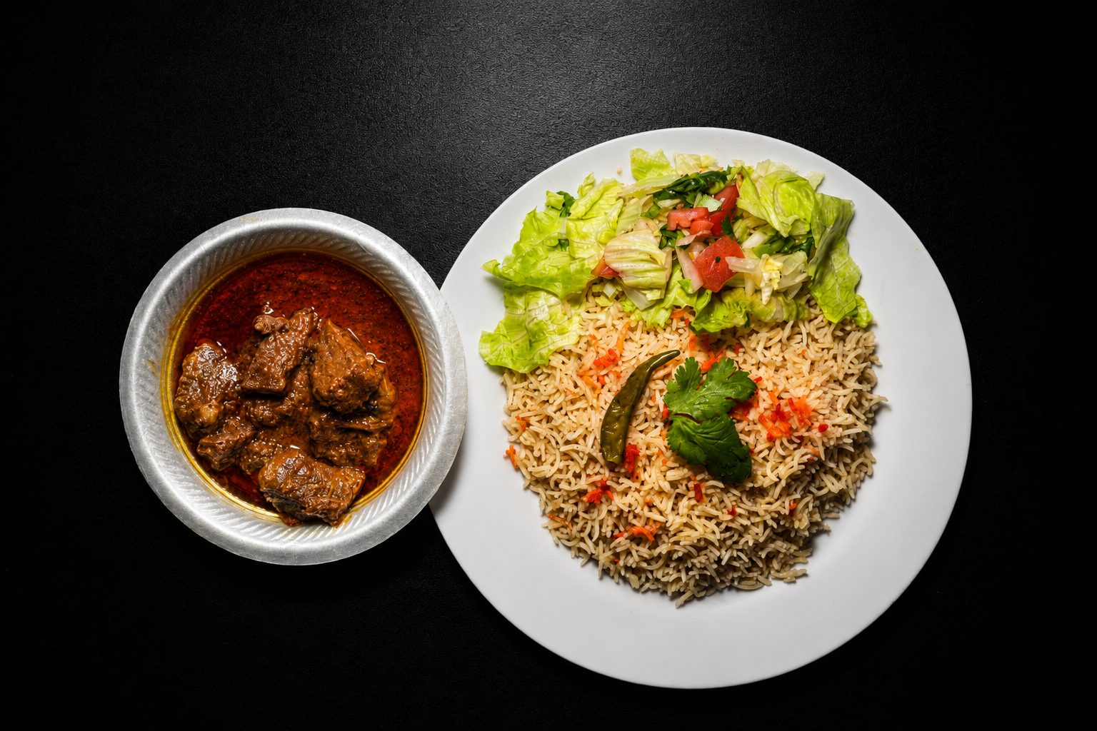 Chicken curry in spiced gravy — food photography